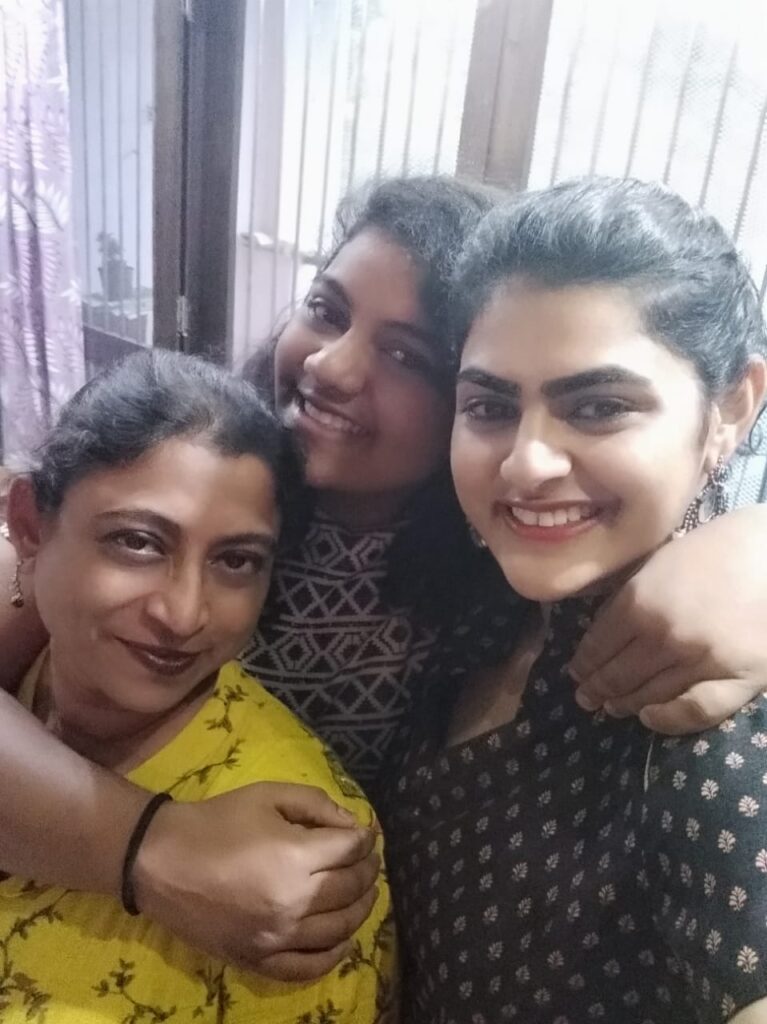 Dolcy Simon with her daughters